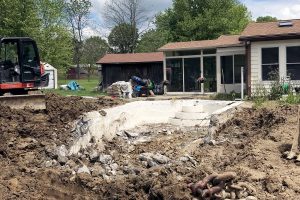 Mid-demolition of a private pool